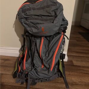Cotopaxi Gray and Orange Technical Backpack for Outdoor Adventures